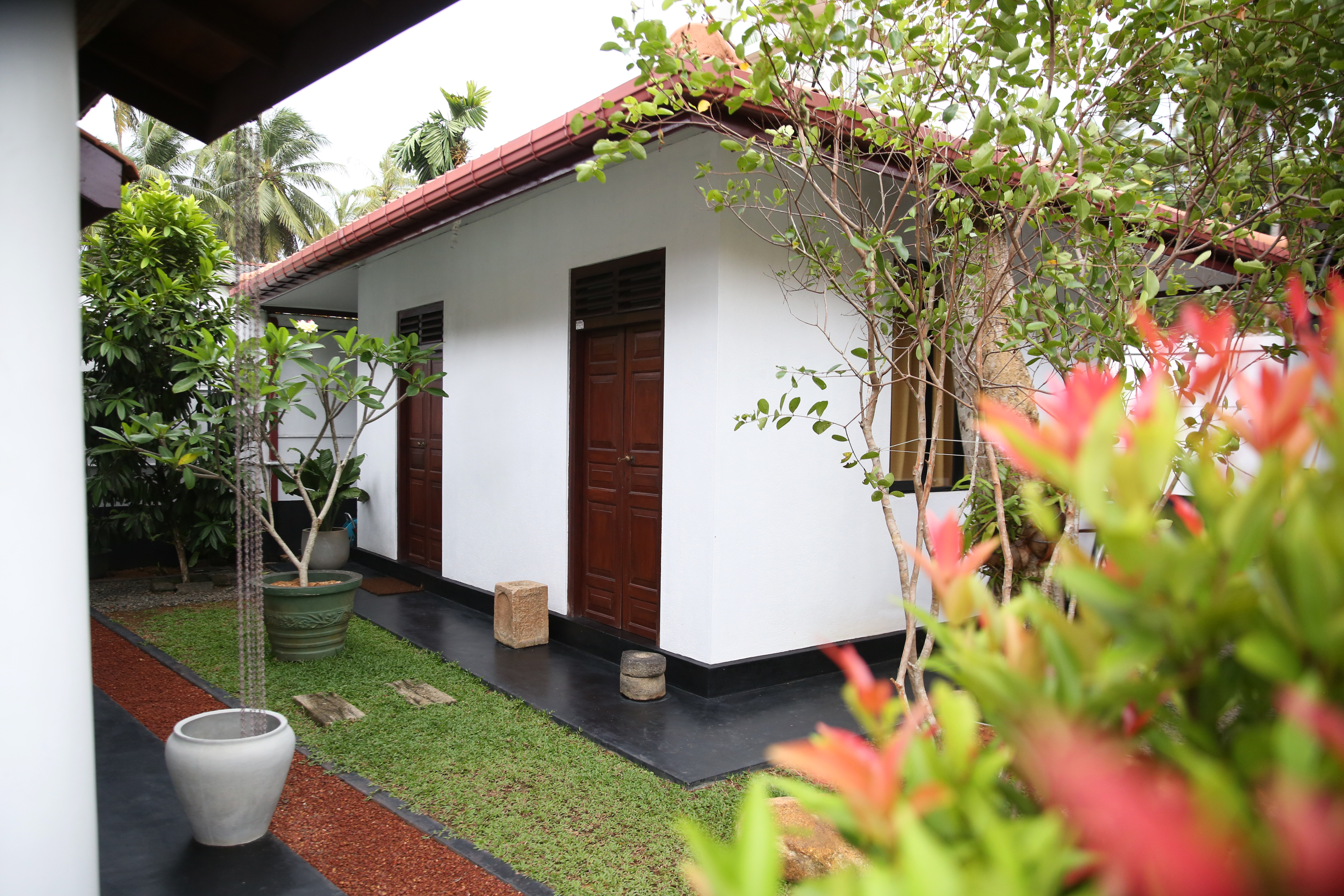 Paved Garden Path and Villa Exterior
